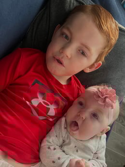 Xzavier and Coralynn cuddling together. 