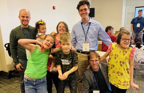 Dr. Ferdinand Althammer smiling with members of the SYS community.